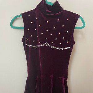Burgundy with rhinestone accents figuring skating dress